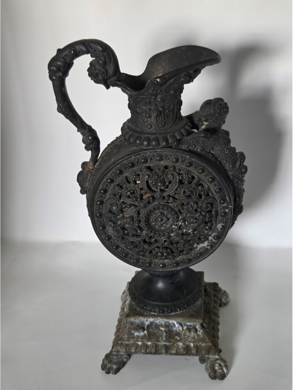 Ornate Vintage Cast Metal Decorative Pitcher Urn With Handle Embossed Base